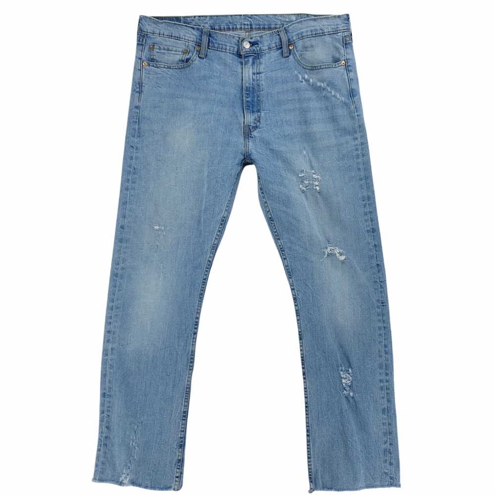 Levi’s 513 Slim Straight Distressed Light Wash Jeans